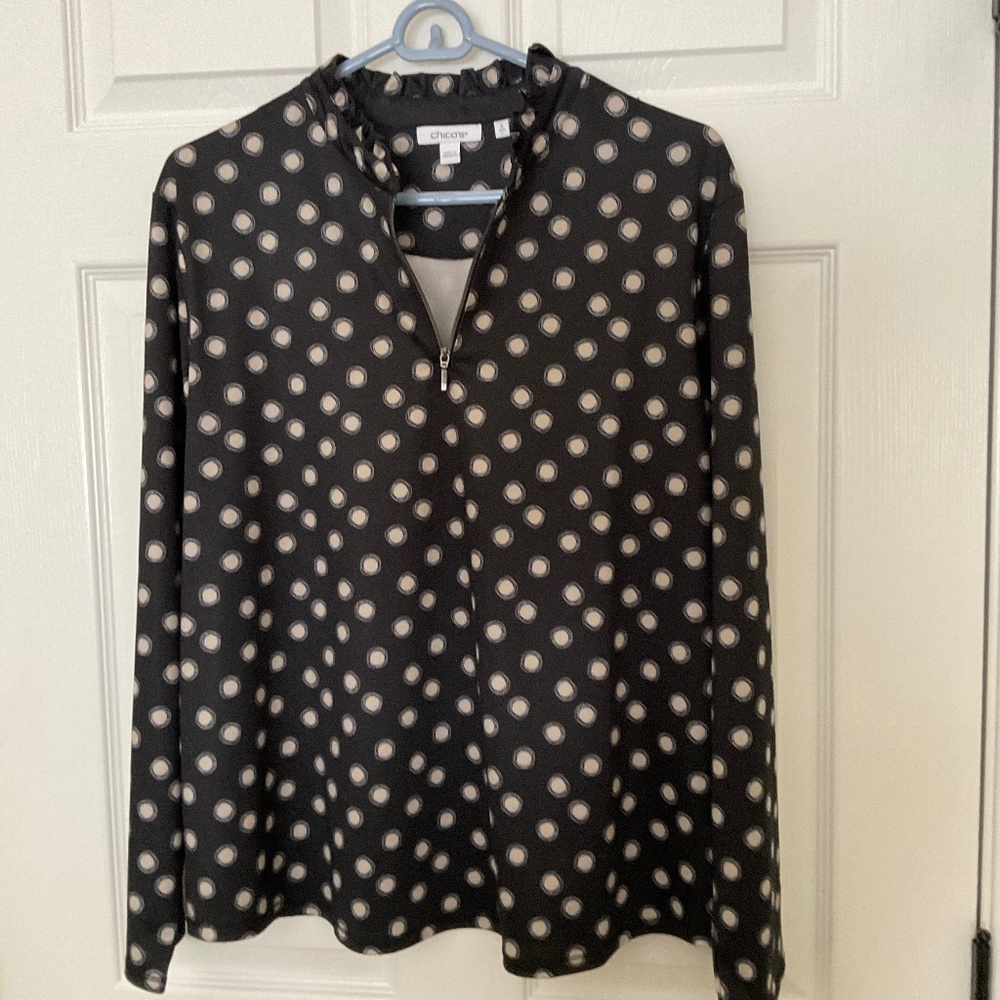 Chicos half zip long sleeve pullover top.  Size 2 (Chico sizing) Black & cream.